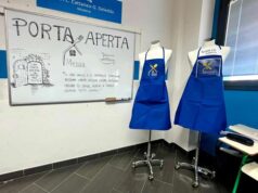 Modena: grembiuli per la mensa di Porta Aperta, con il logo creato dalla 4H del Cattaneo-Deledda