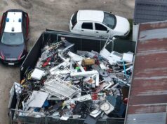 Allacci abusivi alla rete elettrica e gestione illecita di rifiuti: maxi controllo a Correggio, nei guai in 7